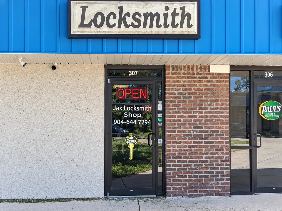 Middleburg Jax Locksmith Shop entrance marked unit 307 under the blue awning