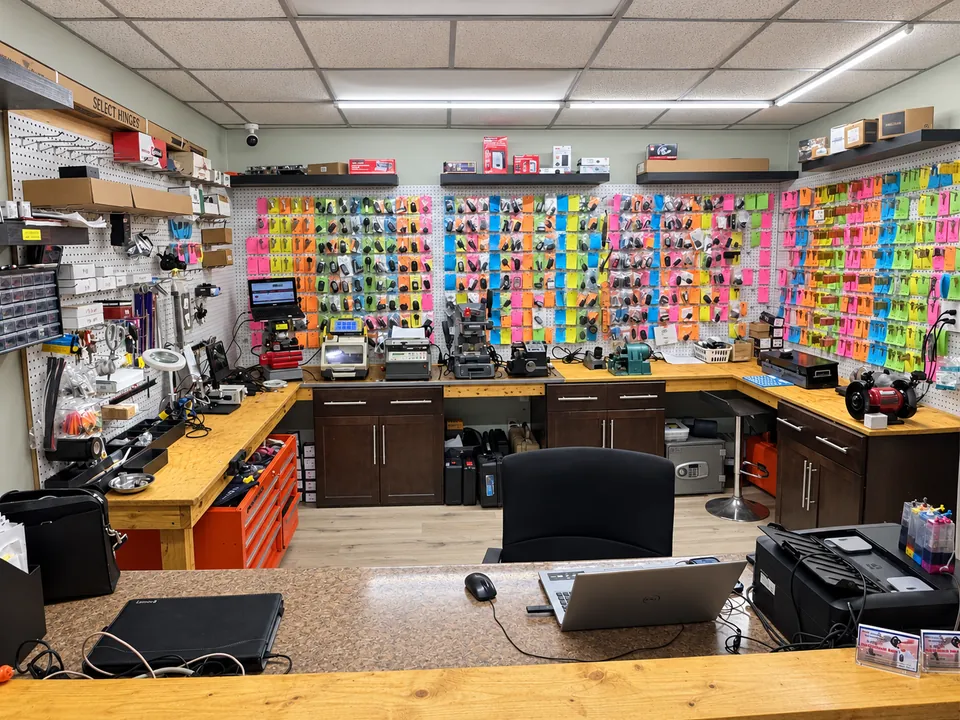 Inside our Neptune Beach locksmith shop, with key displays and key-cutting equipment